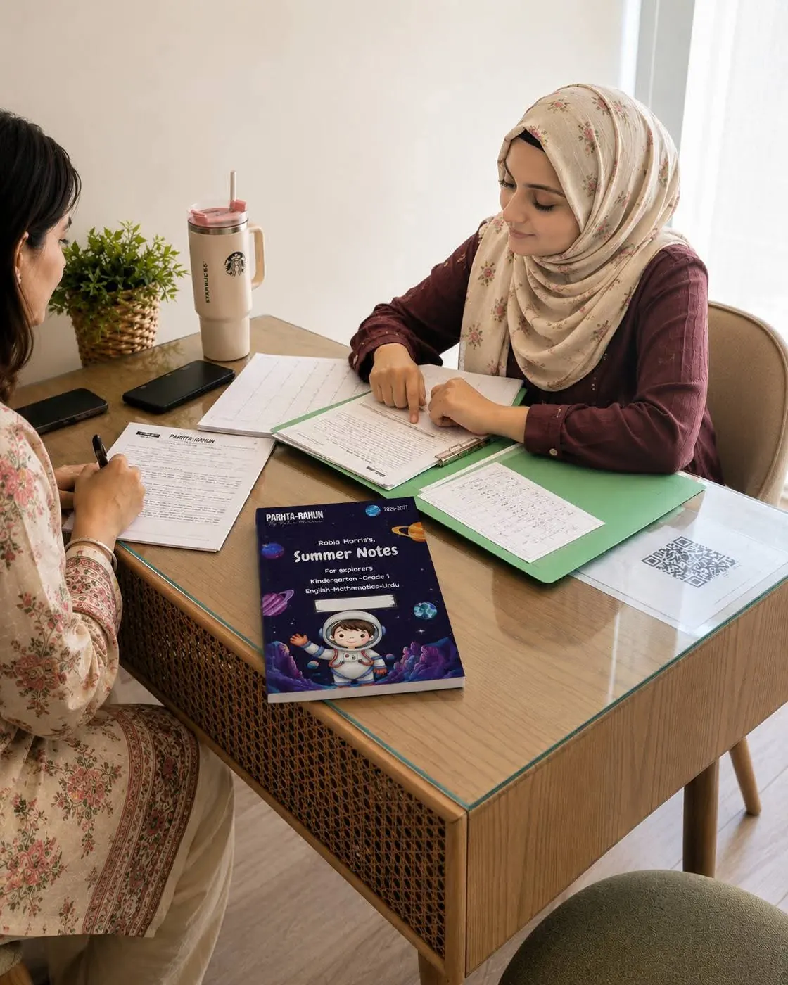 Rabia Harris, founder of PARHTA-RAHUN, tutoring a student